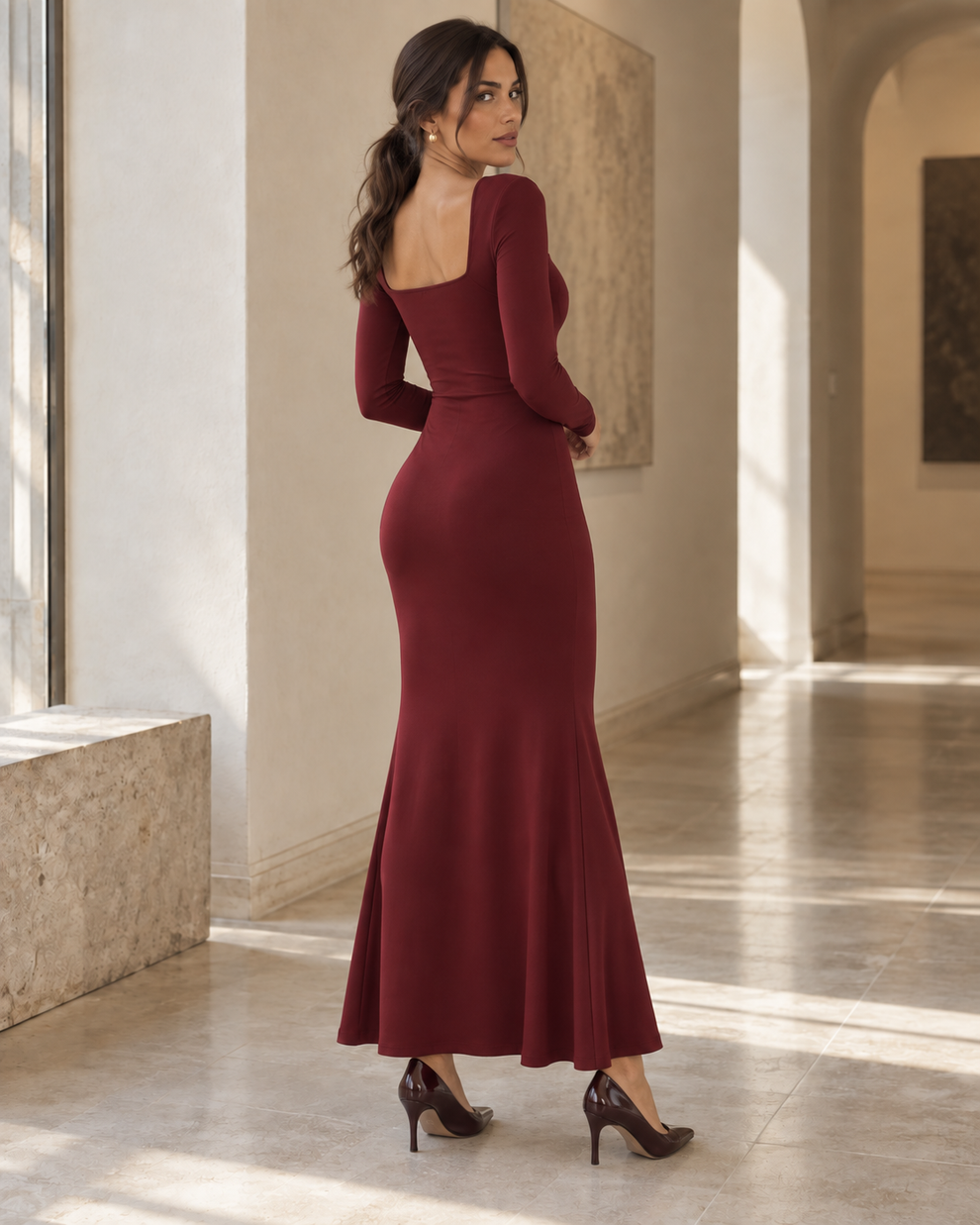 Back and side silhouette of the burgundy maxi dress
