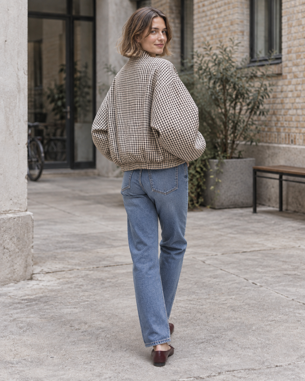 Back and side shape of the oversized checked bomber